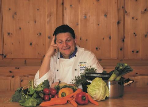 Chef Manfred with fresh vegetables