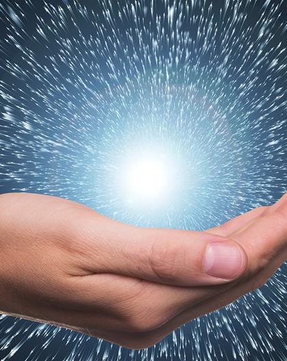 Open hand with a glowing light source emitting radiant beams.