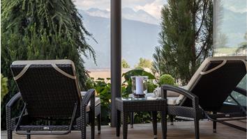 A relaxation area with loungers and a view